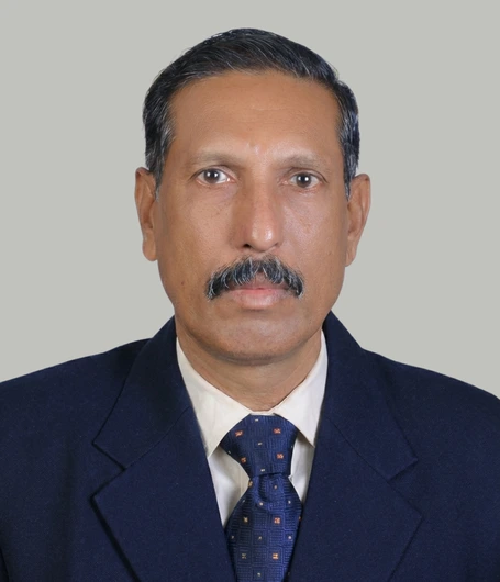 Dr. Raju G